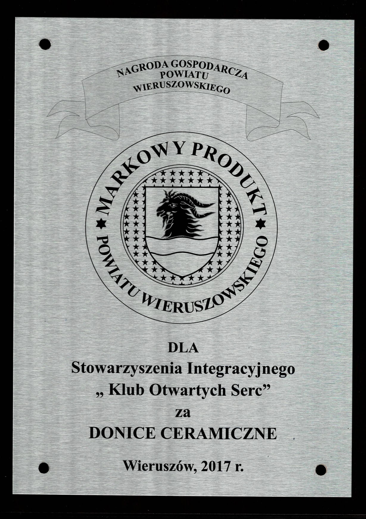 Nagroda gospodarcza powiatu wieruszowskiego. Markowy produkt powiatu wieruszowskiego. Dla Stowarzyszenie integracyjne "Klub otwartych serc" za donice ceramiczne. Wieruszów, 2017 rok.